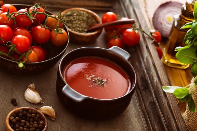 Tomato soup. Homemade tomato soup with tomatoes herbs and spices. Comfort food.