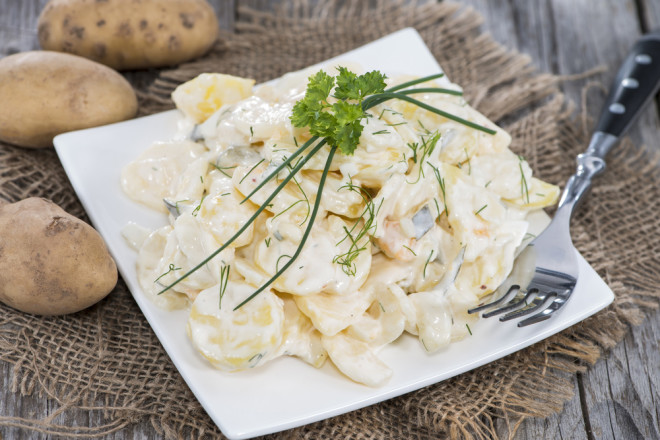 Heap of Potato Salad with some fresh herbs