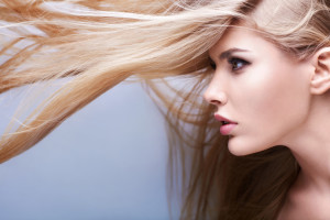 Young attractive girl with flying hair