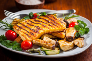 Halloumi grilled cheese on mushrooms and vegetables