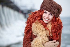 Attractive red hair woman in wintertime outdoor