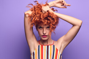 Fashion Portrait Sensual Redhead Woman on Purple