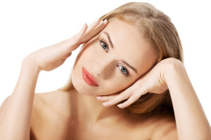 Portrait of beautiful topless caucasian woman. Spa concept. Isolated on white.