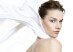 Lightweight beauty visual with a caucasian model wearing a white silk scarf.