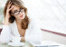 photo of beautiful woman sitting in a coffee house